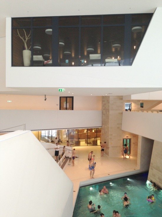 Lounge on the second floors offers great views down to the pools and slides